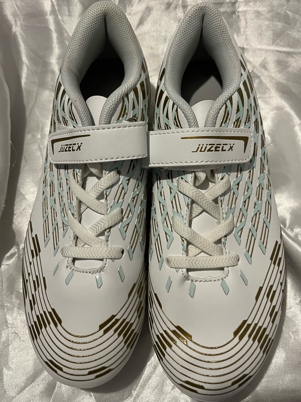 Kids White and Gold Athletic Sneakers with Light Blue Accents